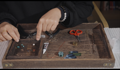 Complete materials kit for velvet flower hair stick including silk floss, tassels, tools, and hair stick base