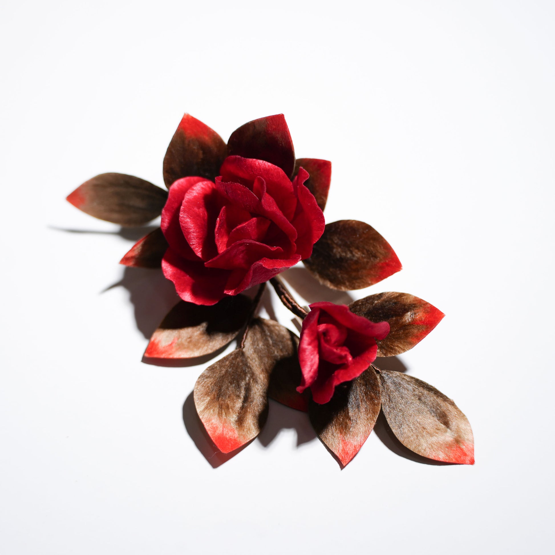 Red Chinese velvet flower rose brooch with brown leaves - handmade silk floss craft front view