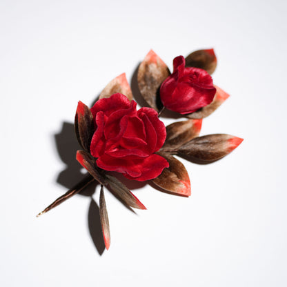 Velvet flower rose brooch close-up showing realistic petal layers and leaf details
