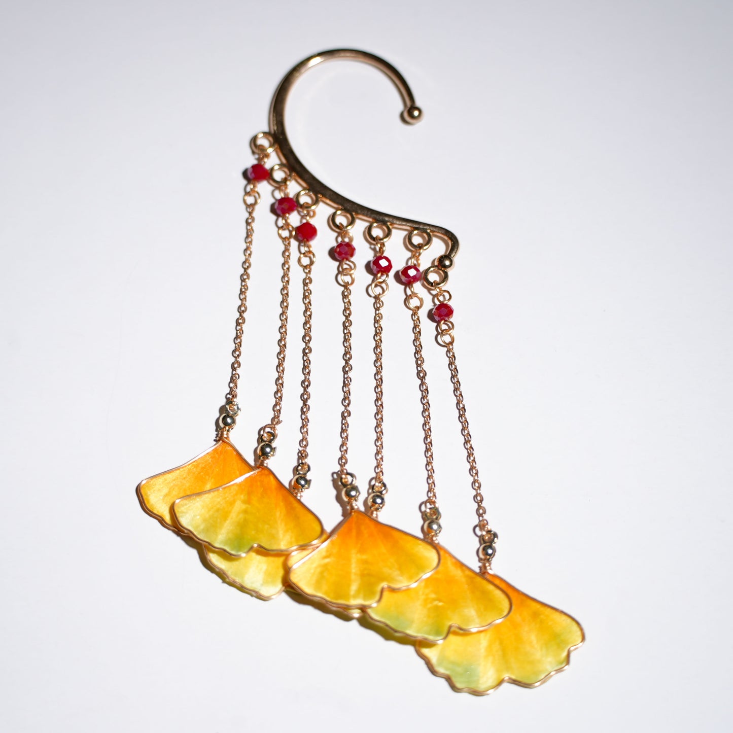 Yellow gradient Chinese velvet flower ginkgo leaf ear hook with golden chain tassels and red beads - product photo