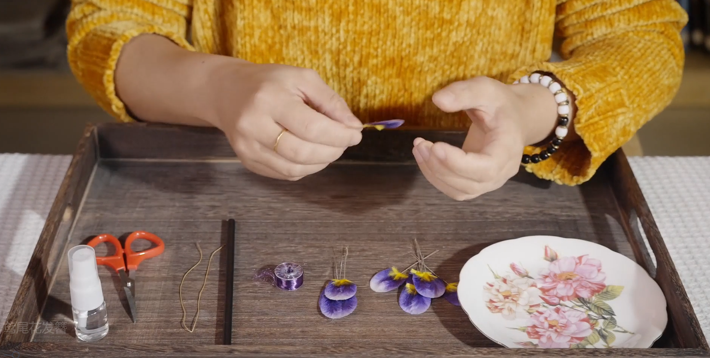 Complete materials kit for velvet flower iris hair stick including silk floss, wire, and tools