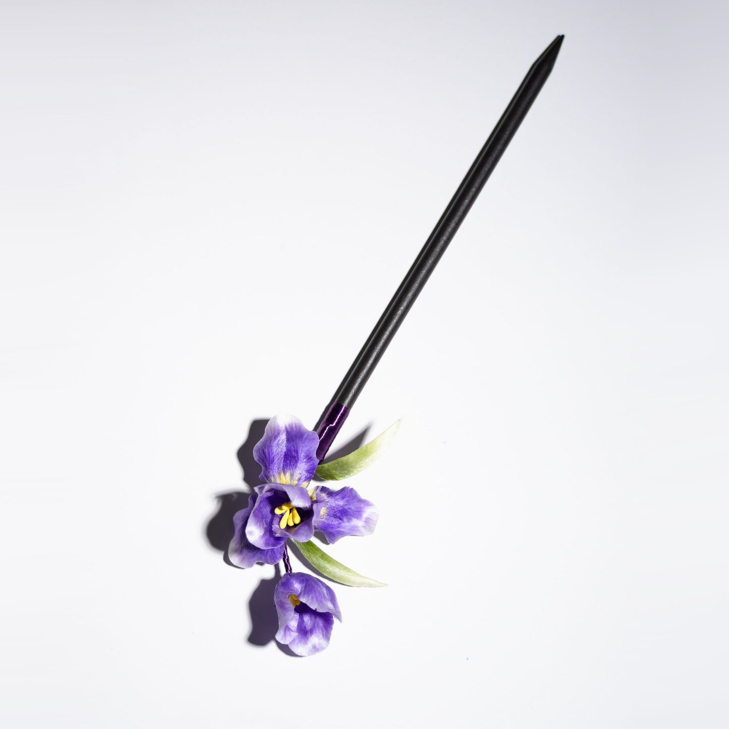 Velvet flower iris hair stick different angle showing ruffled petal details